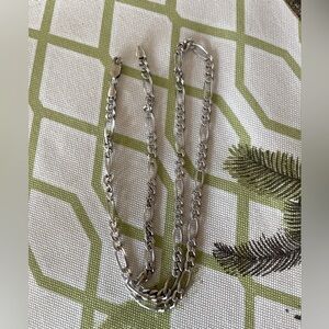 925 genuine Sterling from Italy/stamped Figaro chain.